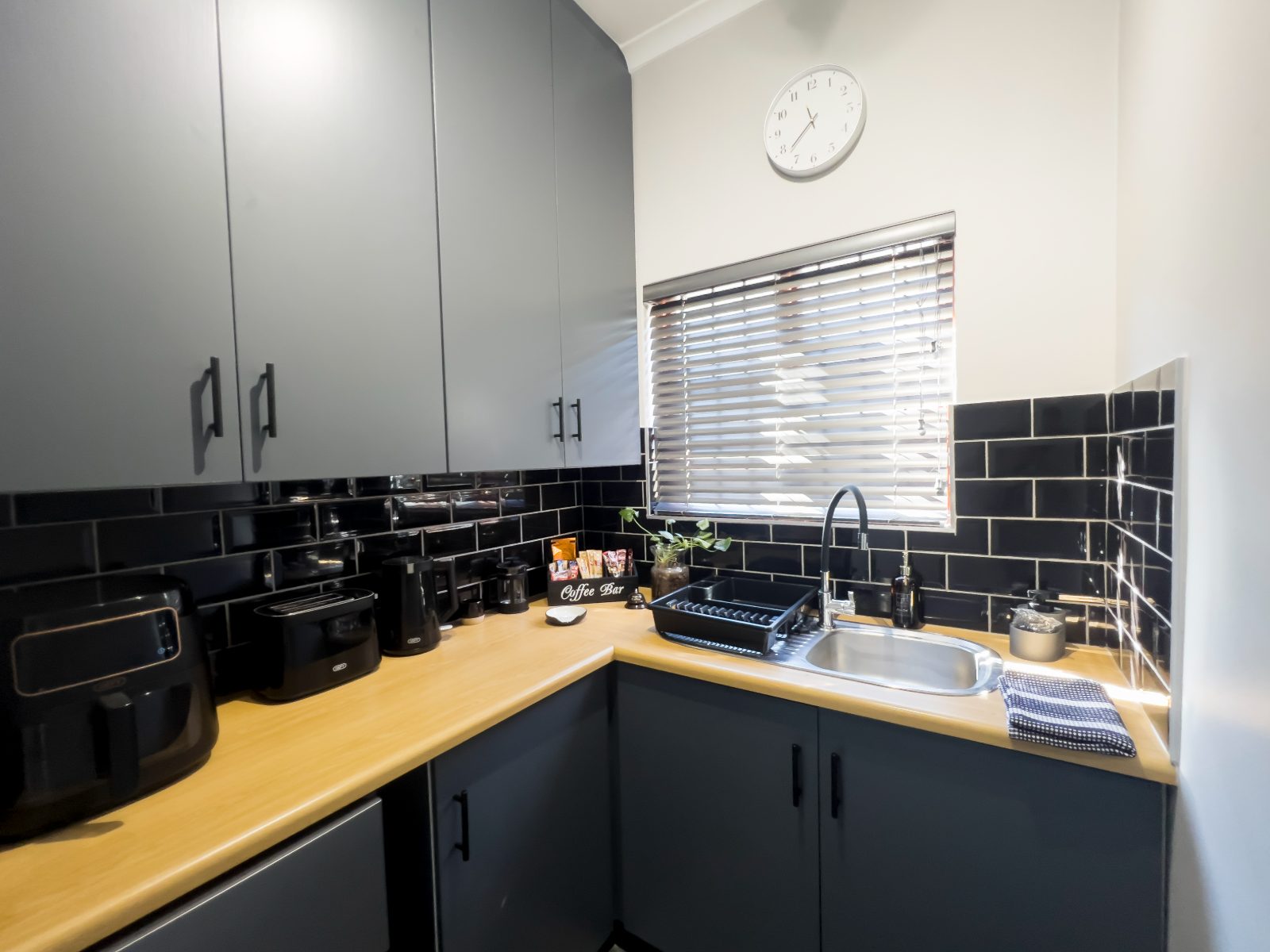 Kitchen with airfryer, toaster and kettle